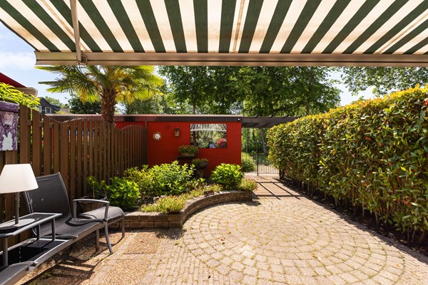 Foto - Te koop: Goed onderhouden tussenwoning in rustige woonwijk!